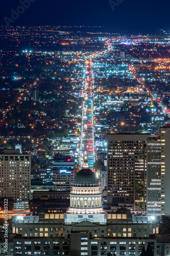 Utah State Capitol night view illuminated with lights at night after sunset  in Salt Lake City  mountain view
