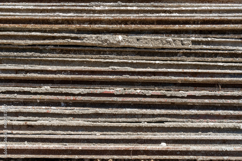 Texture of a pile of metal and concrete building scaffolding Texture of a pile of metal and concrete building scaffolding