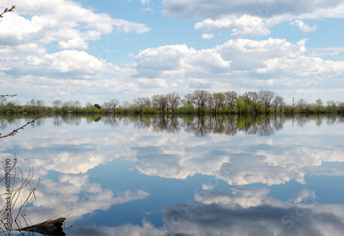 Spring landscape on the river bank in the Obolonsky district of the city of Kyiv photo