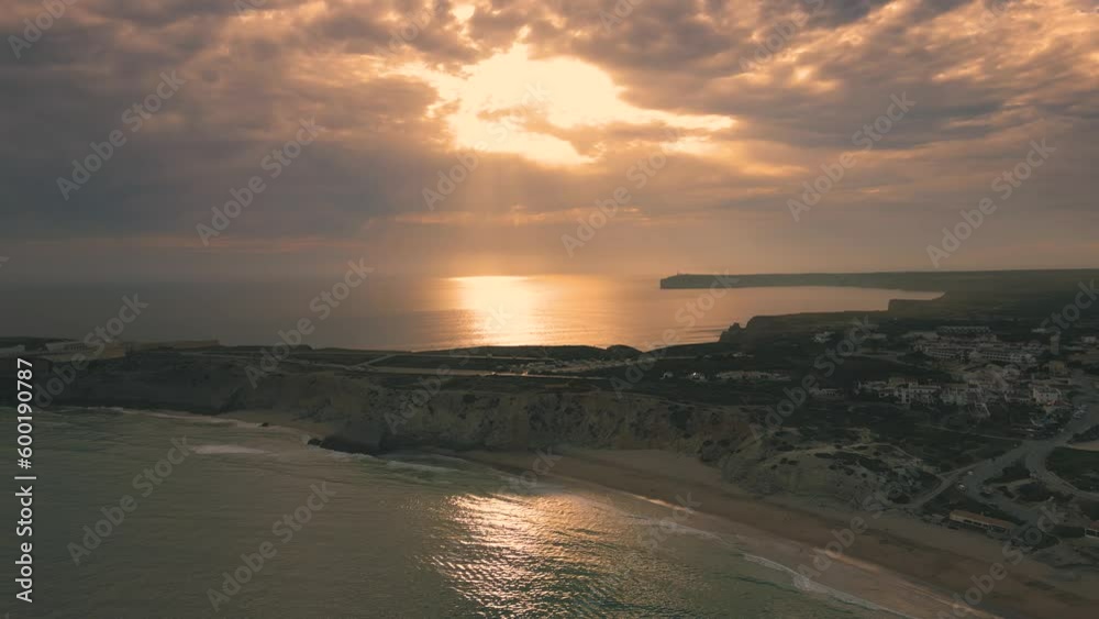 Aerial view of sunset clouds over the ocean in Sagres, Portugal Aerial view of sunset clouds over the ocean in Sagres, Portugal
