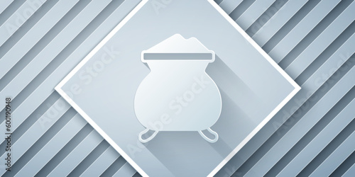 Paper cut Molten gold being poured icon isolated on grey background. Molten metal poured from ladle. Paper art style. Vector