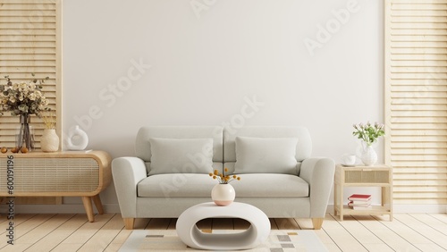 Empty living room with gray sofa and table on empty white wall background. 3d rendering