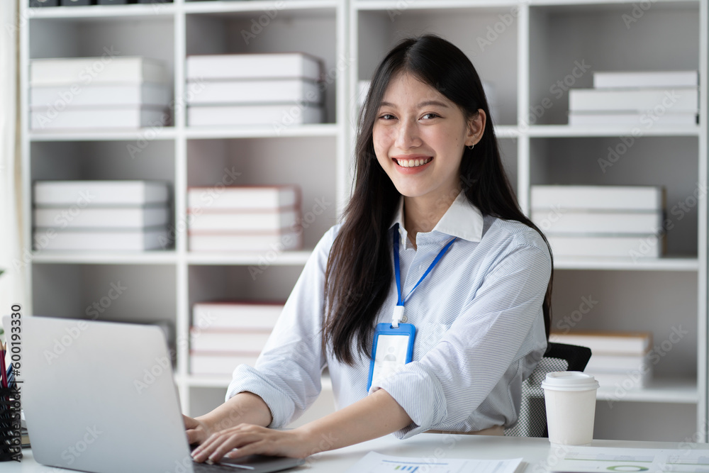 Portrait of young beautiful businesswoman working in the office room. Portrait of young beautiful businesswoman working in the office room.