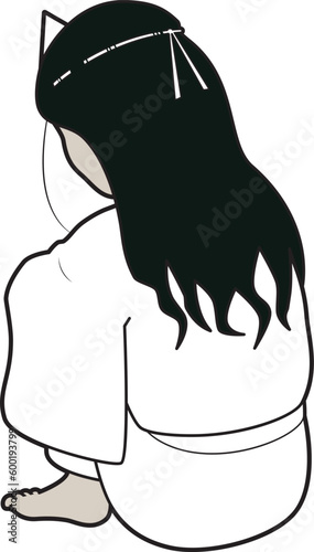 膝を抱える女性幽霊