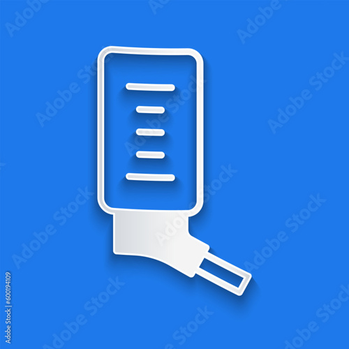 Paper cut Automatic drinker for small pets icon isolated on blue background. Paper art style. Vector