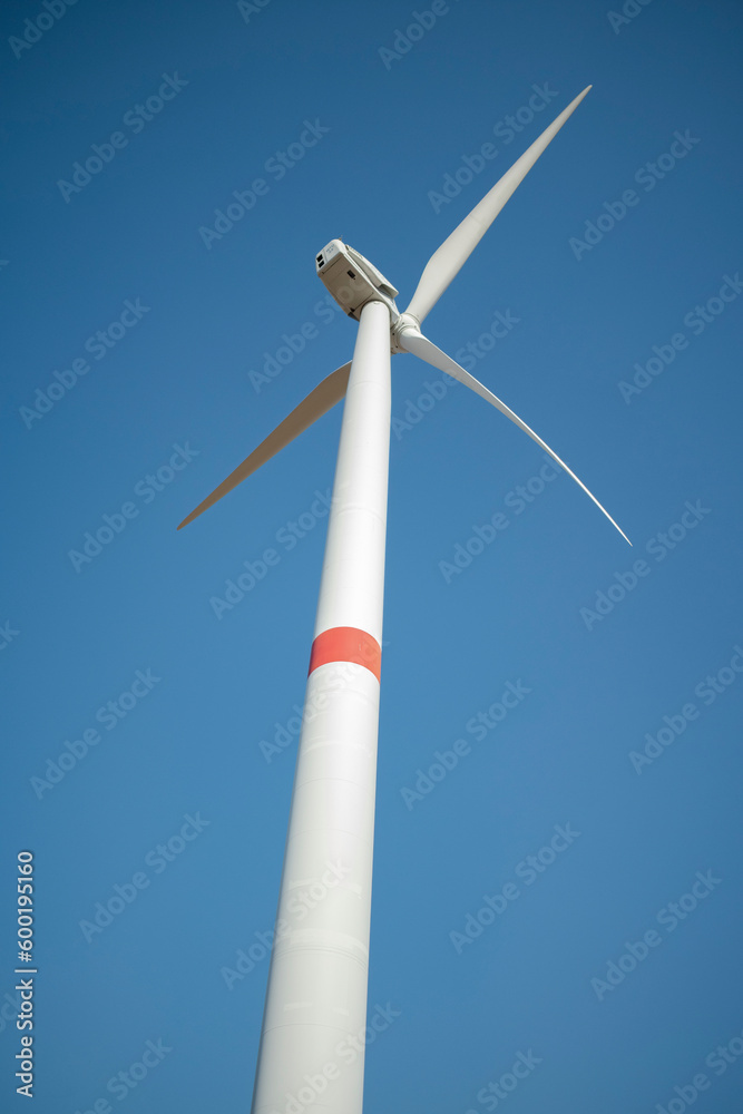 Windmill against a clear white sky Windmill against a clear white sky