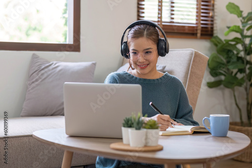 Asian girl student online learning class study online video call zoom teacher, Happy asian girl learn english language online with computer laptop..