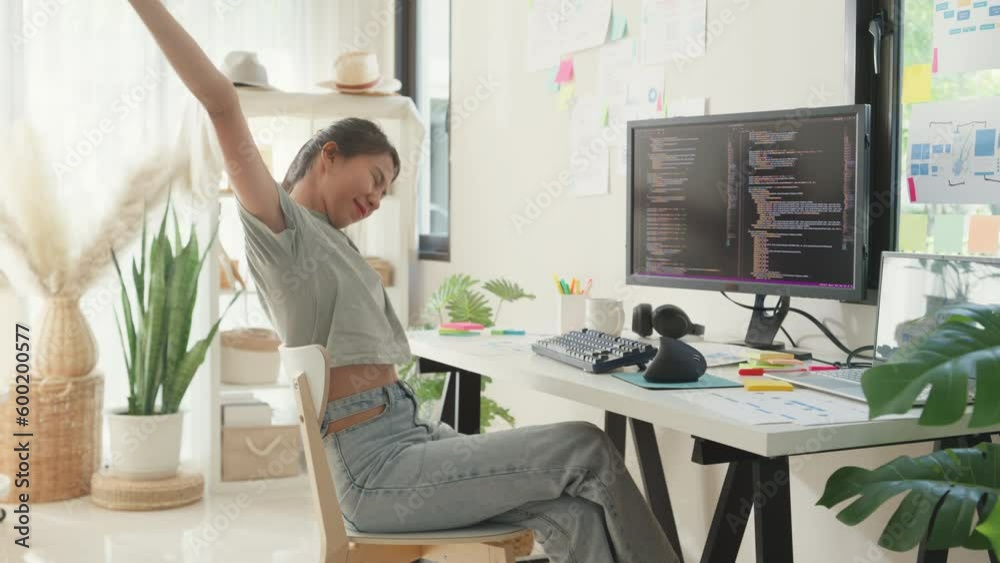 Programmer Overwork Young Asia girl development programmer overwork relax stretch muscle ...