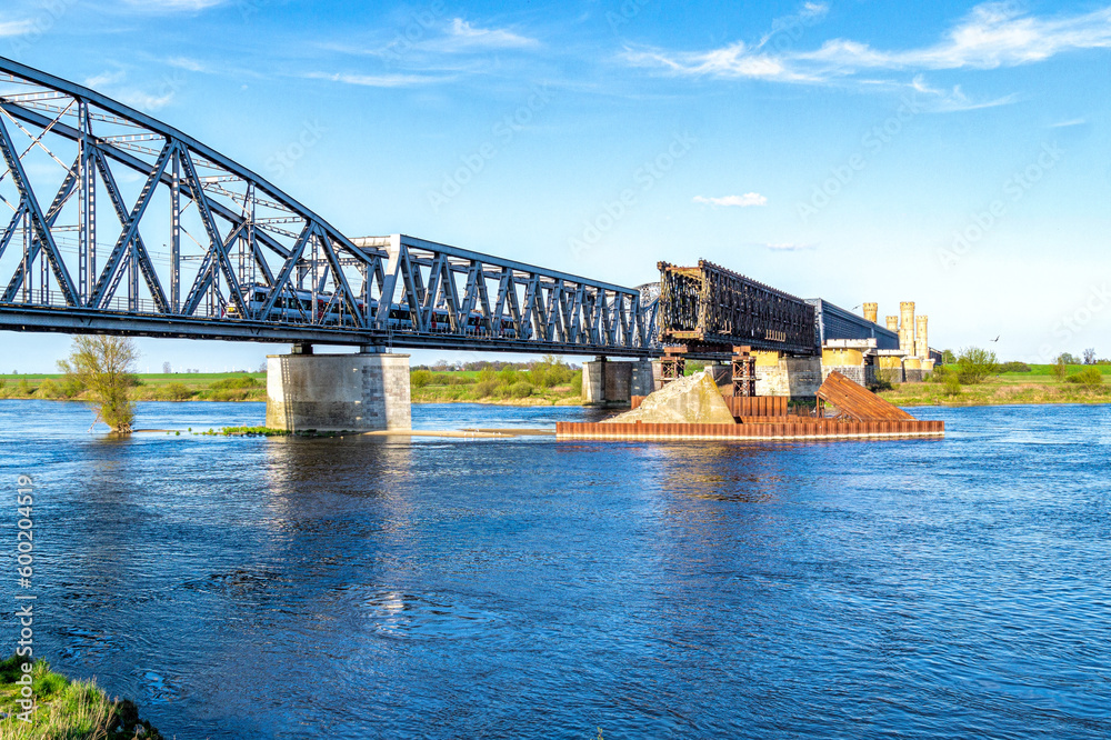 Naklejka premium Old ruined railway bridge. Railroad transportation in Europe