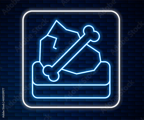 Glowing neon line Archeology icon isolated on brick wall background. Vector