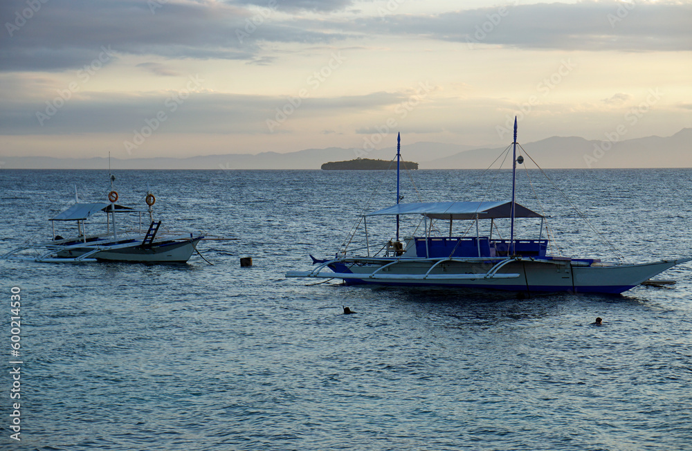 traditional outrigger boats on the philippines islands