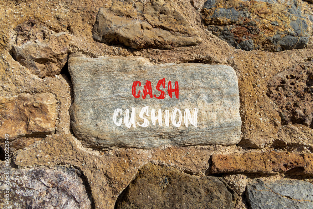 Cash cushion symbol. Concept words Cash cushion on beautiful big grey stone. Beautiful stone wall background. Business and Cash cushion concept. Copy space.