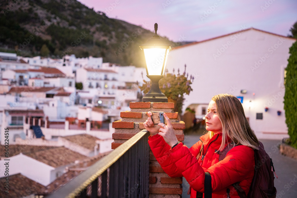 Fototapeta premium woman strolling in picturesque village of Mijas. Costa del Sol Andalusia Spain