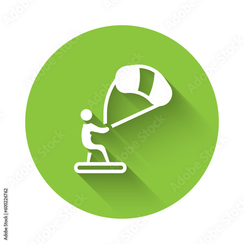 White Kitesurfing icon isolated with long shadow background. Green circle button. Vector
