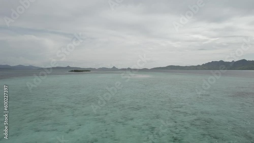 Aerial video on Snake Island Indonesia Aerial view showing boats and tourists enjoying Snake Island photo