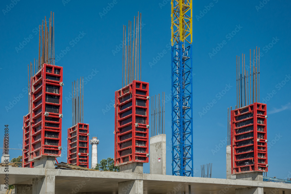 Column formwork and crane on house construction. Stock Photo Adobe Stock