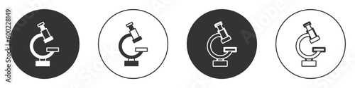 Black Microscope icon isolated on white background. Chemistry, pharmaceutical instrument, microbiology magnifying tool. Circle button. Vector