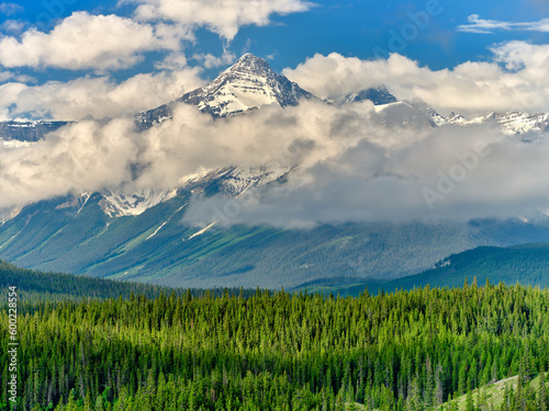 Snow and cloud covered peaks of the Canadian Rockies near Jasper national park