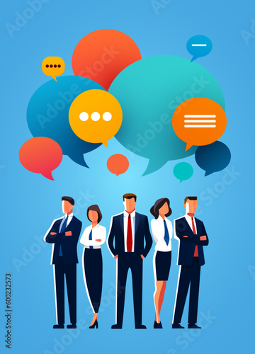 Business people standing together as a team chatting and speaking.