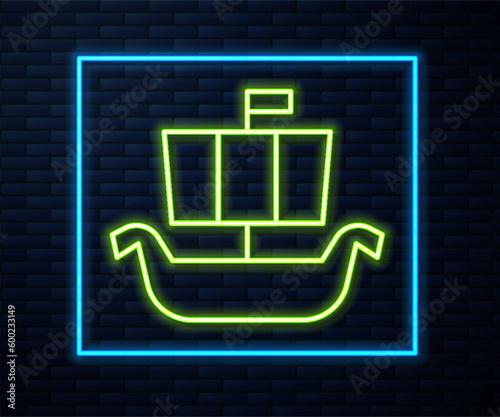 Glowing neon line Ancient viking scandinavian drakkar icon isolated on brick wall background. Viking transport ship. Vector