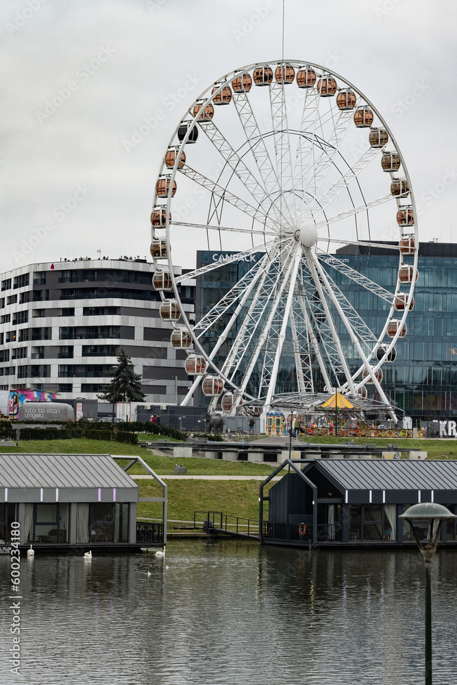 Ferris wheel on the bank of the Vistula river in Krakow