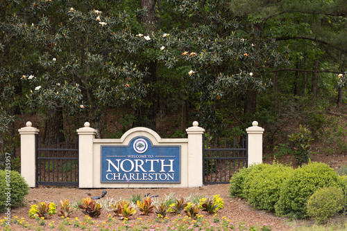 North Charleston, South Carolina city limits welcome sign with trees and flowers off of interstate I-26 in South Carolina
