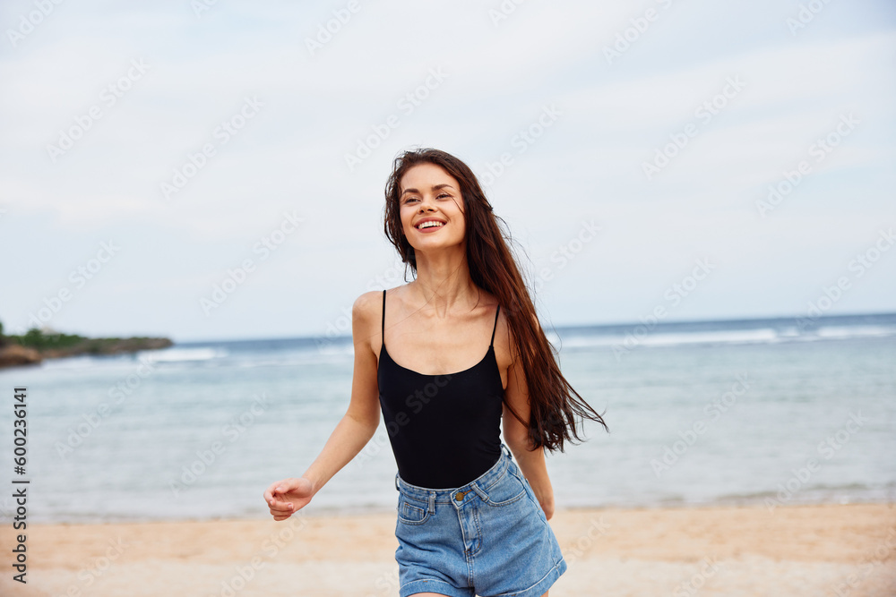 woman running positive young travel sea beach smile summer sunset lifestyle woman running positive young travel sea beach smile summer sunset lifestyle