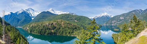 Panorama of Diablo Lake in the Snowcapped North Cascades Mountains and Forest in Whatcom County, Washington, USA