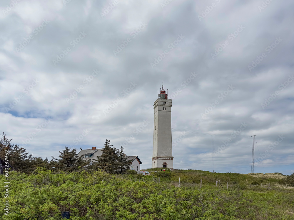 The western most point of Denmark-Blåvand lighthouse on Blåvandshuk with beach view on the west coast of Jutland, Blåvand is a town in Varde municipality in Jutland in Denmark The western most point of Denmark-Blåvand lighthouse on Blåvandshuk with beach view on the west coast of Jutland, Blåvand is a town in Varde municipality in Jutland in Denmark