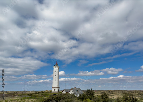 The western most point of Denmark-Blåvand lighthouse on Blåvandshuk with beach view on the west coast of Jutland, Blåvand is a town in Varde municipality in Jutland in Denmark