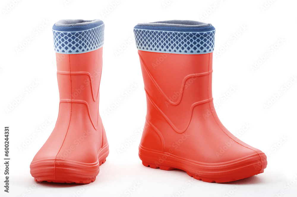 Red rubber boots isolated on white background. Kids shoes. Full depth of field. Close-up Red rubber boots isolated on white background. Kids shoes. Full depth of field. Close-up