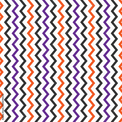 Vector seamless pattern with vertical orange, violet and grey zig zag stripes in cartoon style. Vector chevron design in orange, purple and grey colours