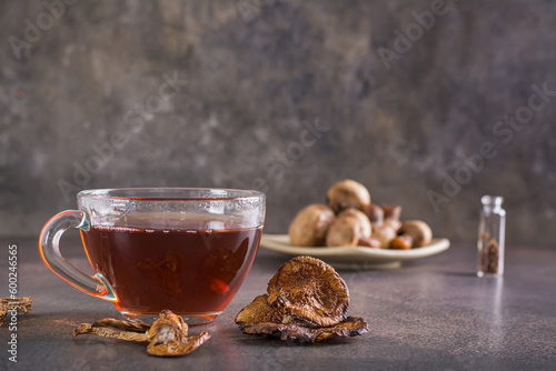 Fototapeta Naklejka Na Ścianę i Meble -  Organic mushroom tea in a cup for alternative herbal medicine