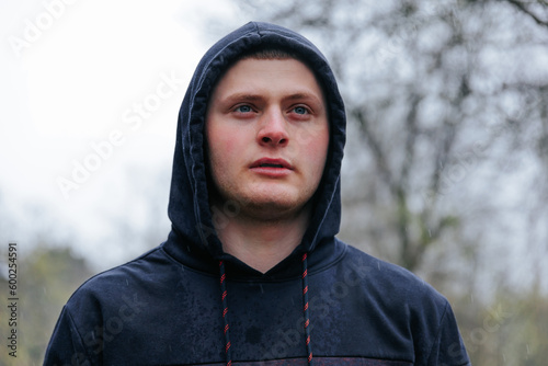 Fotografi Mysterious Guy with Handsome Portrait in Rainy Outdoor