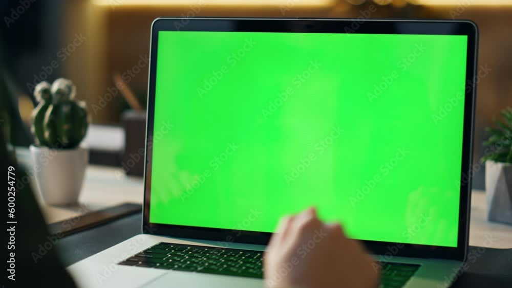 Unknown worker talking green screen laptop at video call workplace close up. Unknown worker talking green screen laptop at video call workplace close up.
