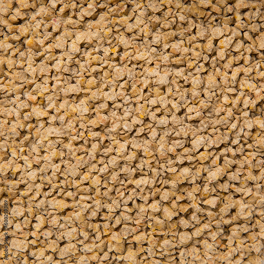 Looped Rotation of Compacted Wooden Sawdust Pellets with Brown Stones. - Natural Cat Litter Filler or Organic Fuel. Toilet Particles. Macro Looped Rotation of Compacted Wooden Sawdust Pellets with Brown Stones. - Natural Cat Litter Filler or Organic Fuel. Toilet Particles. Macro