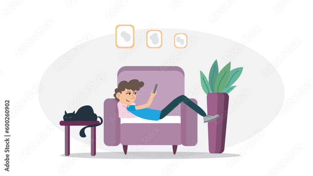 Boy is laying down on armchair and looking his telephone. Smiling boy with his telephone on armchair. Boy and his cat in living room laying down. Boy is laying down on armchair and looking his telephone. Smiling boy with his telephone on armchair. Boy and his cat in living room laying down.