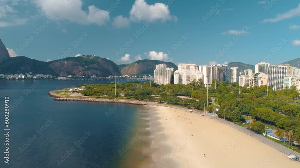 RIO DE JANEIRO, BRASIL - MAY, 2023: Drone aerial view of of Botafogo beach and district and Guanabara Bay. Modern and historical buildings on the shore on background at sunny day from above. RIO DE JANEIRO, BRASIL - MAY, 2023: Drone aerial view of of Botafogo beach and district and Guanabara Bay. Modern and historical buildings on the shore on background at sunny day from above.