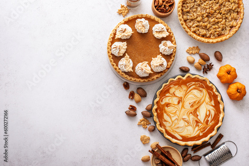 Traditional Thanksgiving pies with pumpkin pie in the middle