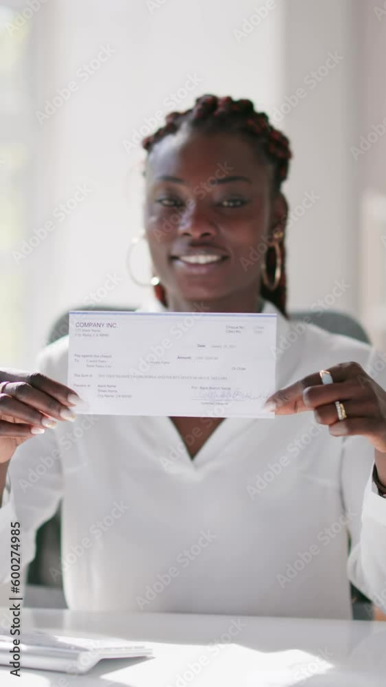 Holding Paycheck Or Payroll Check Or Insurance Cheque Holding Paycheck Or Payroll Check Or Insurance Cheque