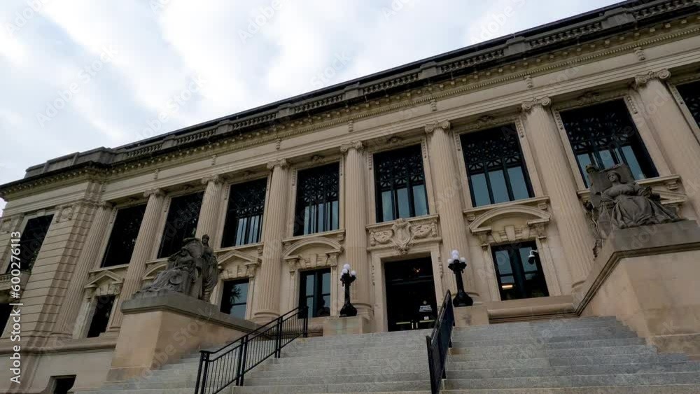 Partial Front View of the Illinois Supreme Courthouse Building with American Flag. Located in Springfield, Illinois, USA Partial Front View of the Illinois Supreme Courthouse Building with American Flag. Located in Springfield, Illinois, USA