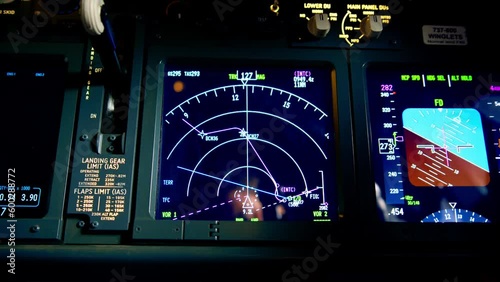 A detailed shot of the radar control and navigation panel in the cockpit of the flight simulator data on the on-board computer