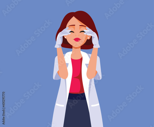 Stressed Medical Doctor Suffering from a Headache Vector Cartoon Illustration. Unhappy depressed medical worker feeling desperate and sad
