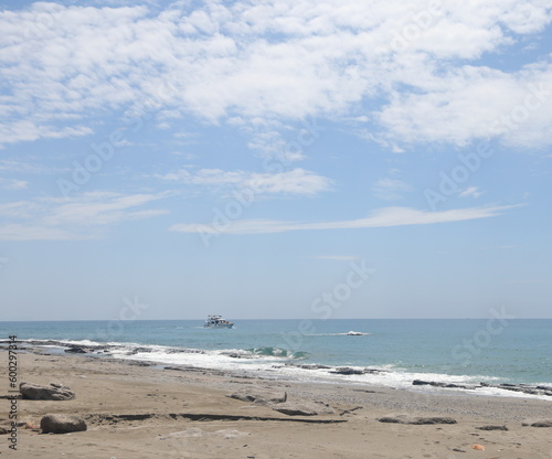 Rocky sea beach on a sunny day in Alanya, Turkiye, May 2023.
