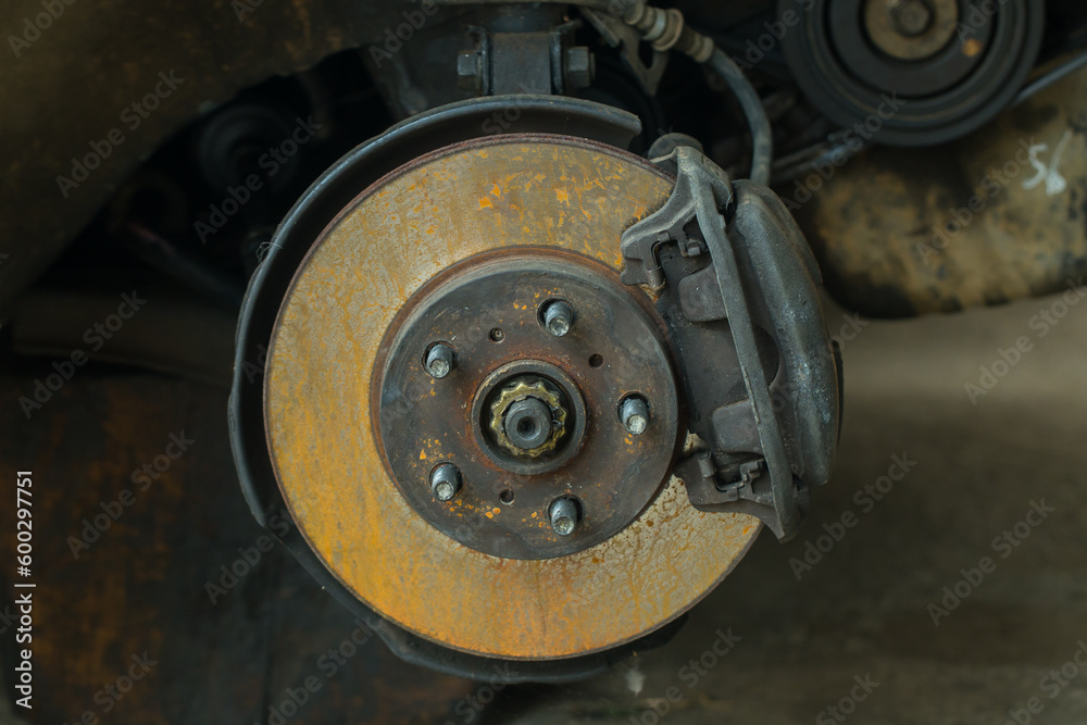 Remove wheels, disc brakes, brake calipers. rusty car wheels