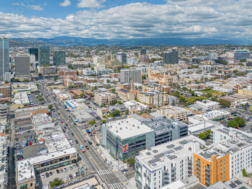 Los Angeles, California – May 3, 2023: aerial city view drone photo toward Olympic Blvd and Vermont Ave in Koreatown LA showing Korean shops, apartments, homes, streets, buildings 