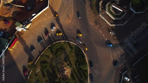 Aerial view above traffic, revealing the downtown of Yaounde, Cameroon - tilt, drone shot photo