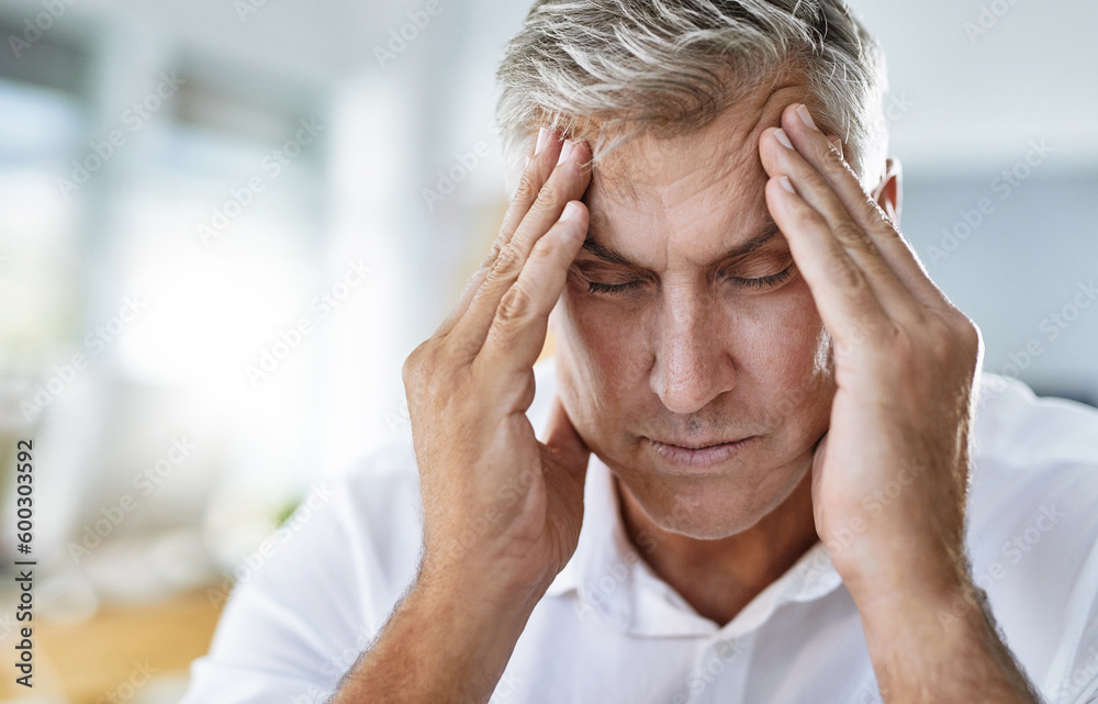 Headache, stress and mature businessman in the office with healthcare problem or medical emergency. Medical issue, burnout and sick professional corporate manager in pain with a migraine in workplace Headache, stress and mature businessman in the office with healthcare problem or medical emergency. Medical issue, burnout and sick professional corporate manager in pain with a migraine in workplace