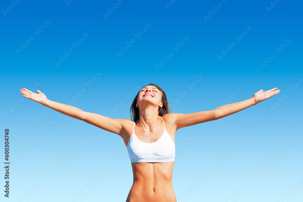 Freedom, woman and sunshine outdoor with happiness and calm feeling with open arms. Blue sky, mindfulness and female person with happy smile and healthy body from sun and celebrate life with wellness Freedom, woman and sunshine outdoor with happiness and calm feeling with open arms. Blue sky, mindfulness and female person with happy smile and healthy body from sun and celebrate life with wellness