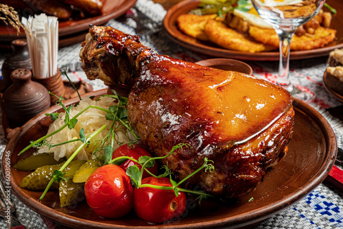 Photography Tasty grilled ham hock on a plate with  cabbage salad